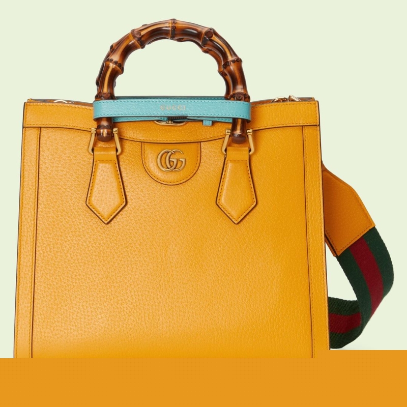 G*u*i top handle bags